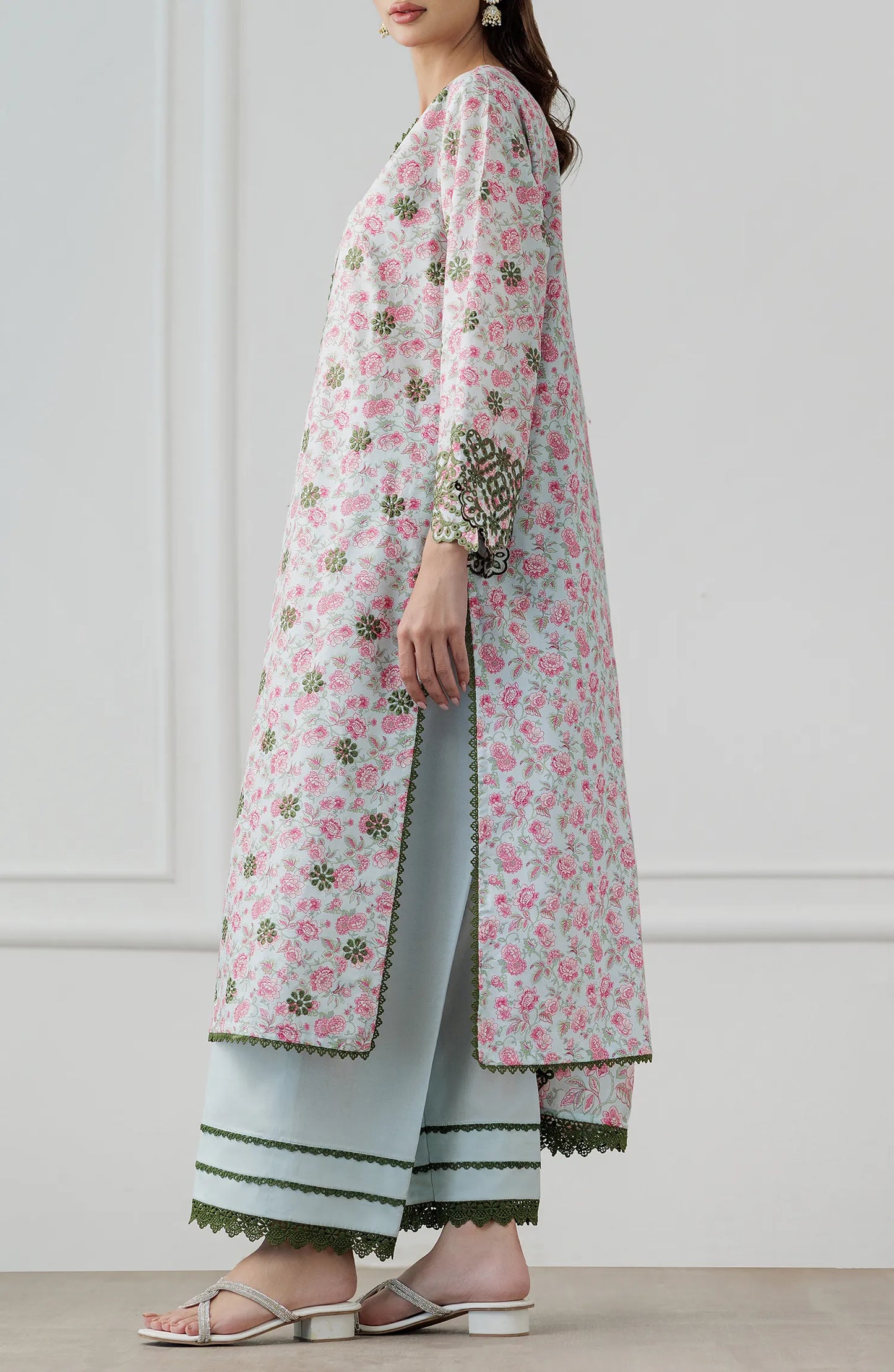 Woman wearing a floral dress with a matching dupatta against a dyed trouser. Stitched Luxury Festive Formal Lawn Shirt Dupatta & Pant - 3 Piece Suits - WRFC25S-3008