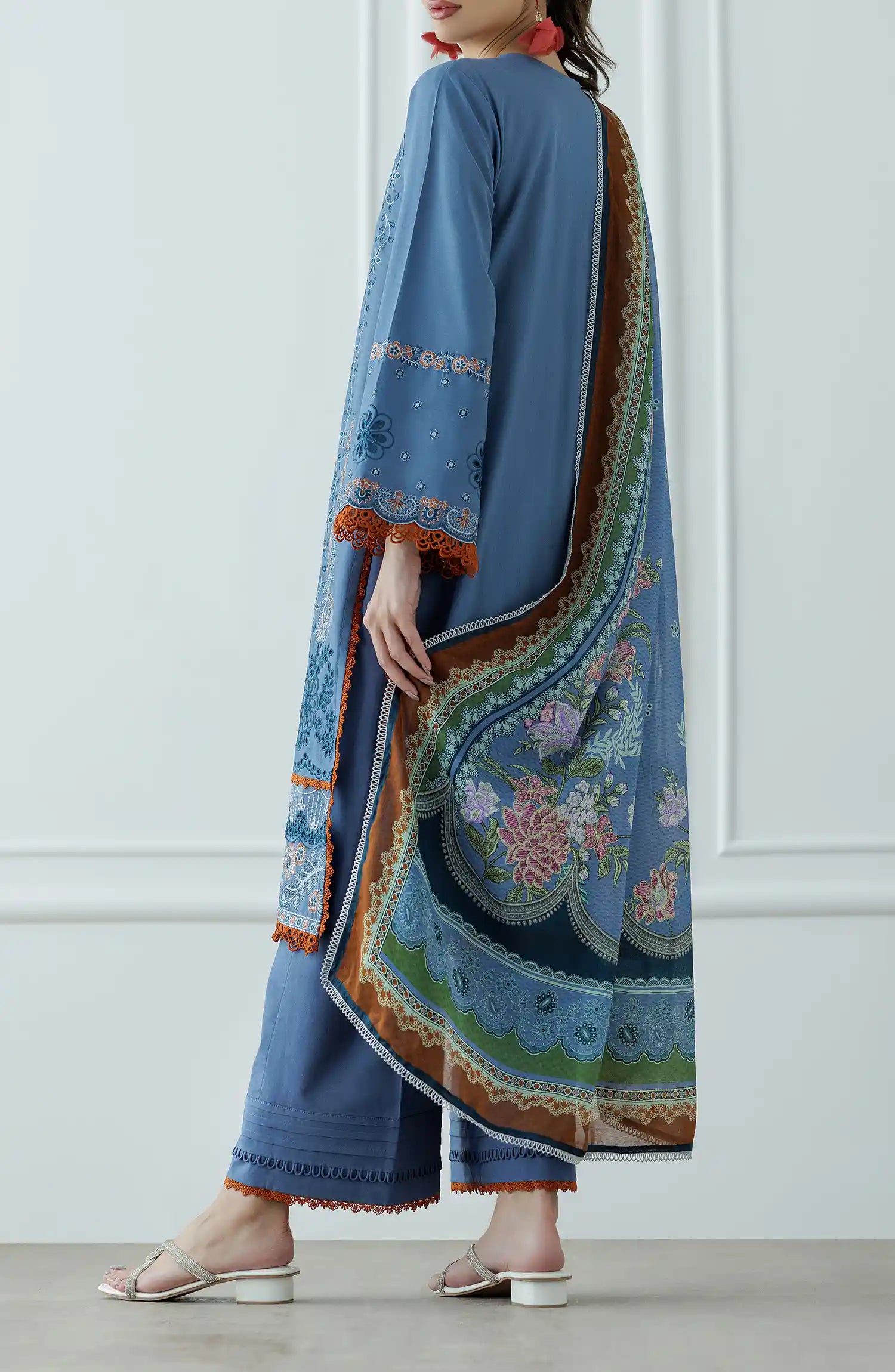 Woman wearing a blue embroidered outfit with a matching dupatta on a dyed trouser. Stitched Luxury Festive Formal Lawn Shirt Dupatta & Pant - 3 Piece Suits - WRFC25S-3025