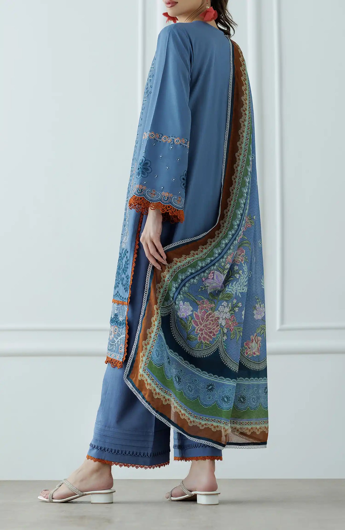 Woman wearing a blue embroidered outfit with a matching dupatta on a dyed trouser. Stitched Luxury Festive Formal Lawn Shirt Dupatta & Pant - 3 Piece Suits - WRFC25S-3025