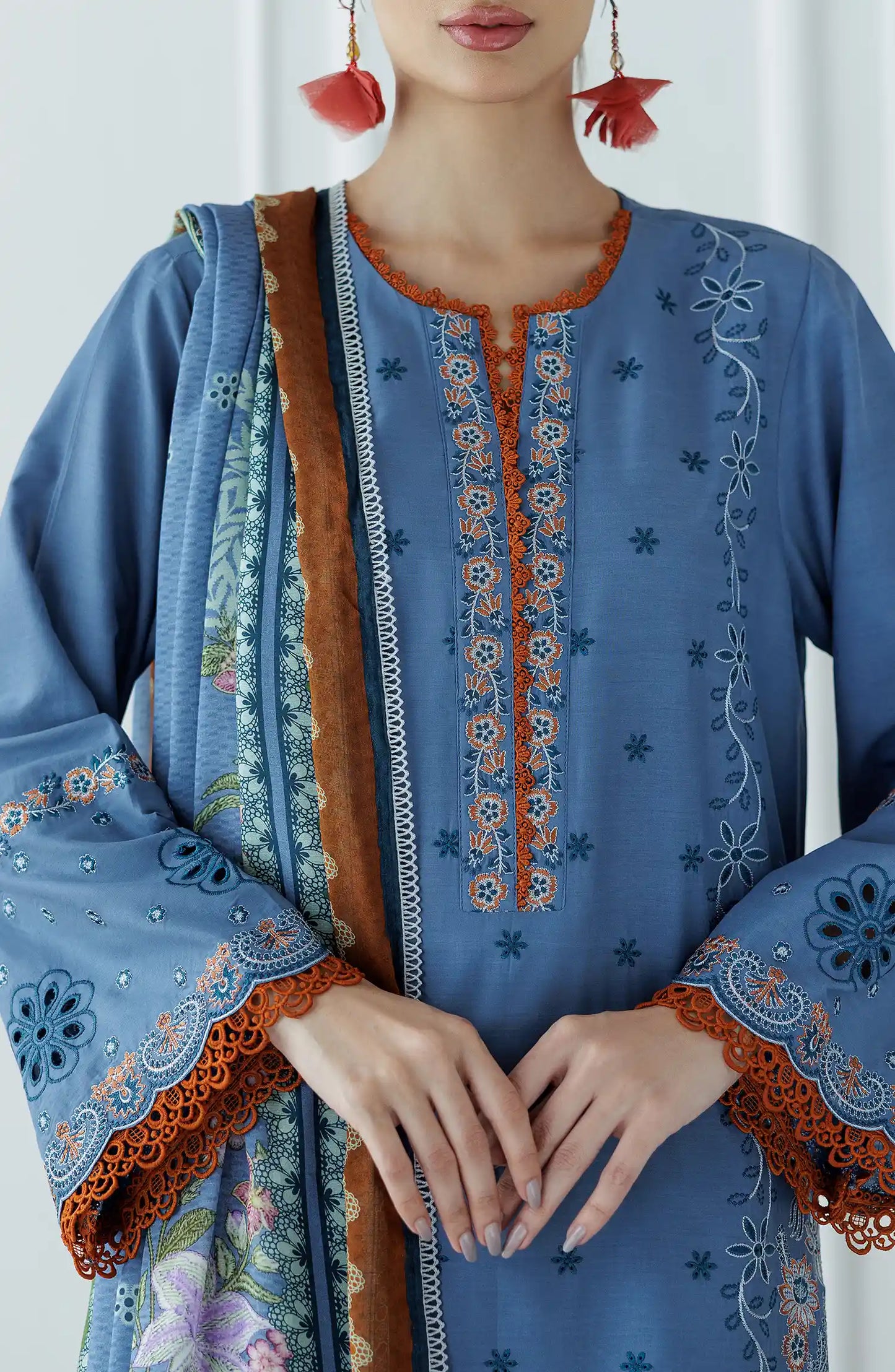 Woman wearing a blue embroidered outfit with a matching dupatta on a dyed trouser. Stitched Luxury Festive Formal Lawn Shirt Dupatta & Pant - 3 Piece Suits - WRFC25S-3025