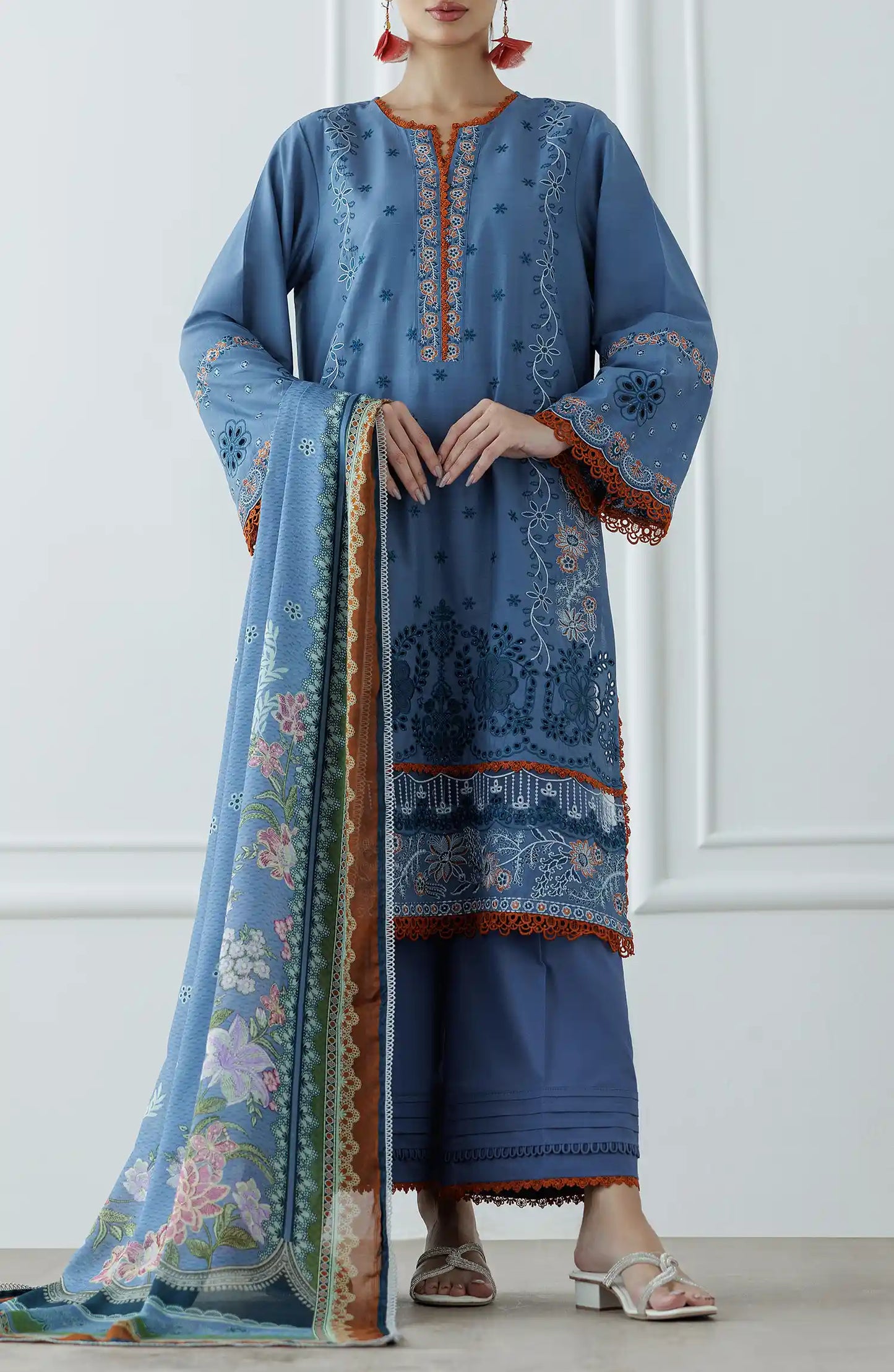 Woman wearing a blue embroidered outfit with a matching dupatta on a dyed trouser. Stitched Luxury Festive Formal Lawn Shirt Dupatta & Pant - 3 Piece Suits - WRFC25S-3025