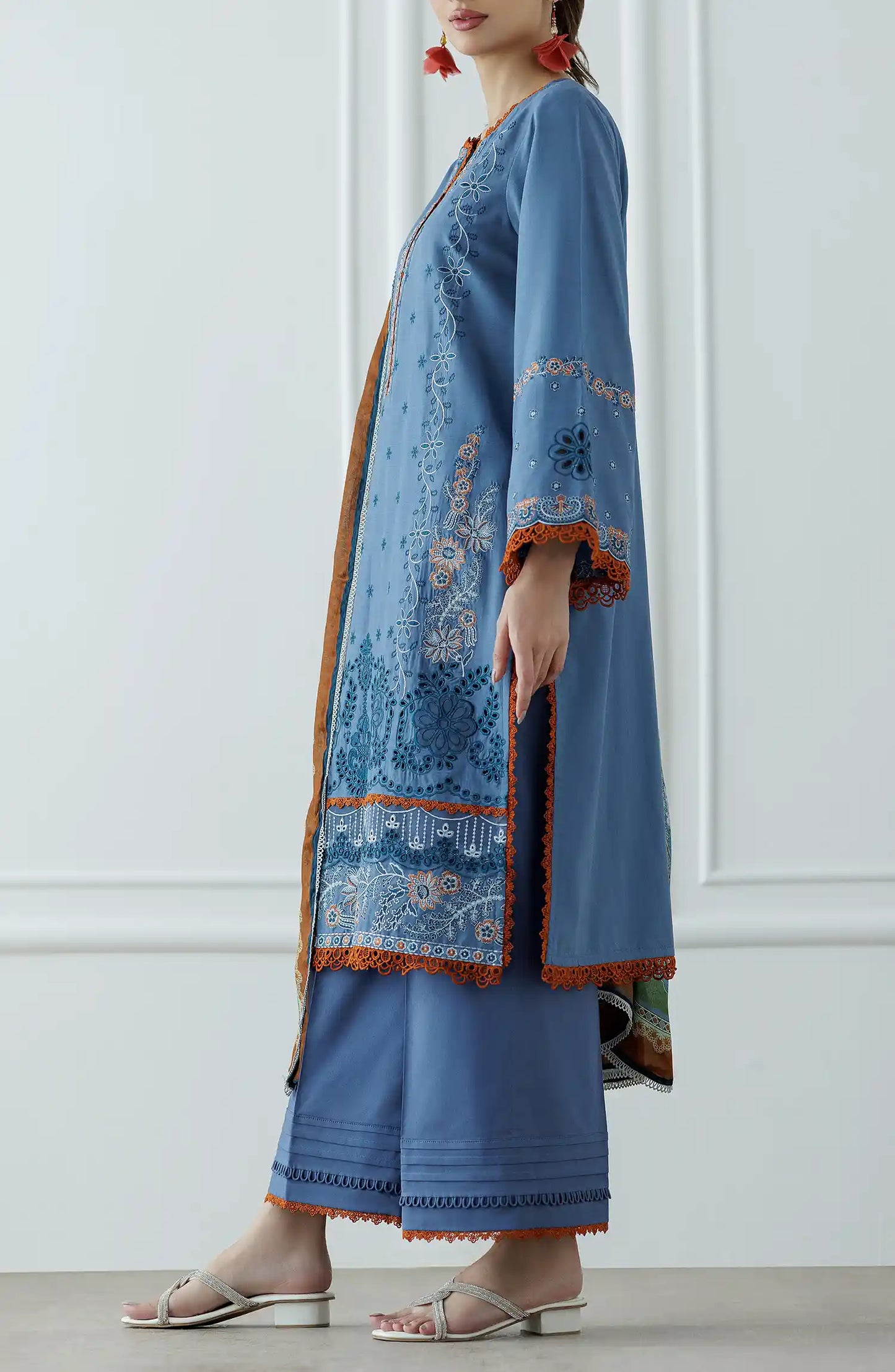 Woman wearing a blue embroidered outfit with a matching dupatta on a dyed trouser. Stitched Luxury Festive Formal Lawn Shirt Dupatta & Pant - 3 Piece Suits - WRFC25S-3025