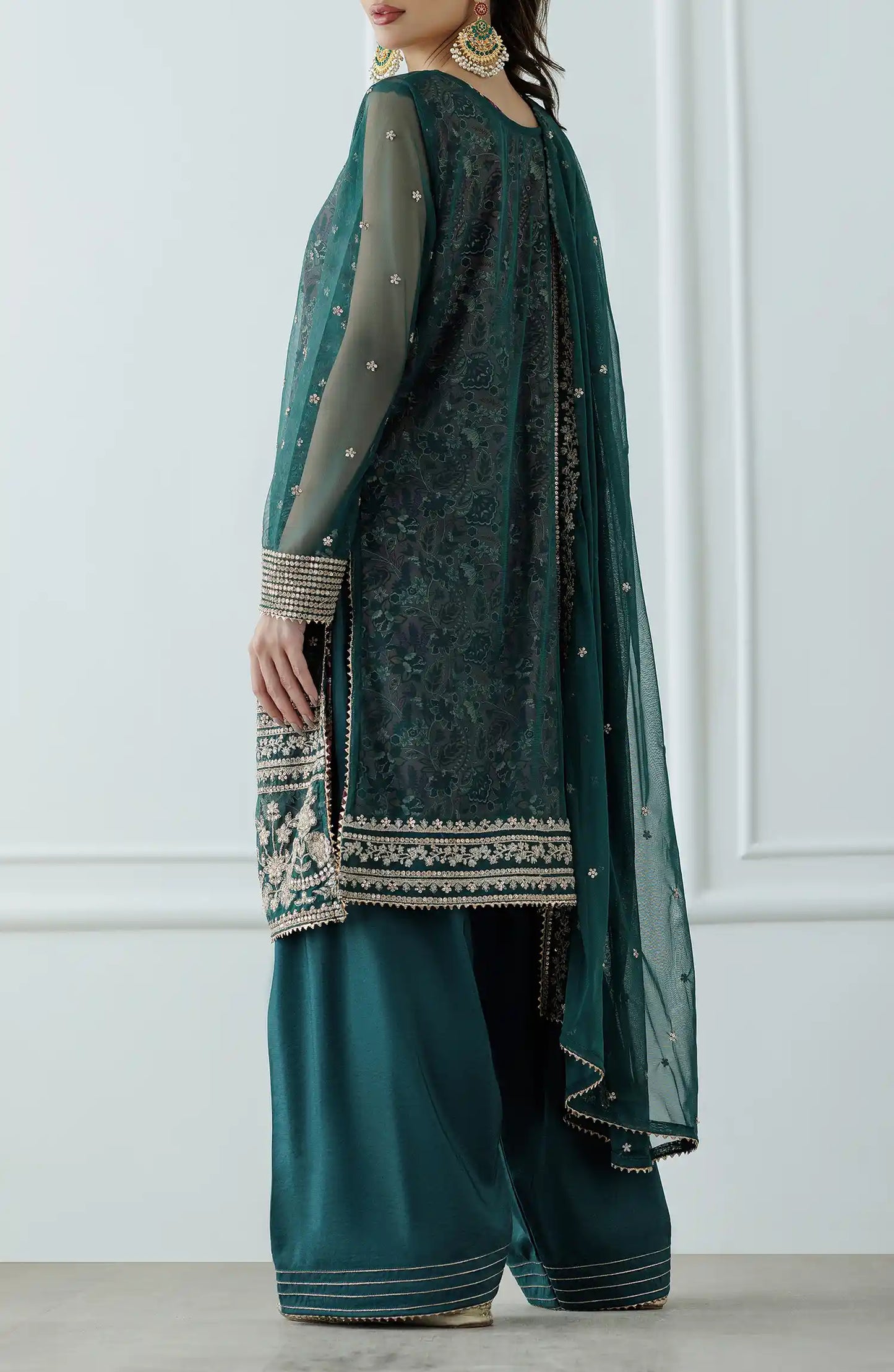 Women wearing a embroidered Teal traditional outfit with intricate embroidery on a farshi shalwar. Stitched Luxury Festive Formal Poly Net Shirt Dupatta & Pant - 3 Piece Suits - WRFP24W-3001