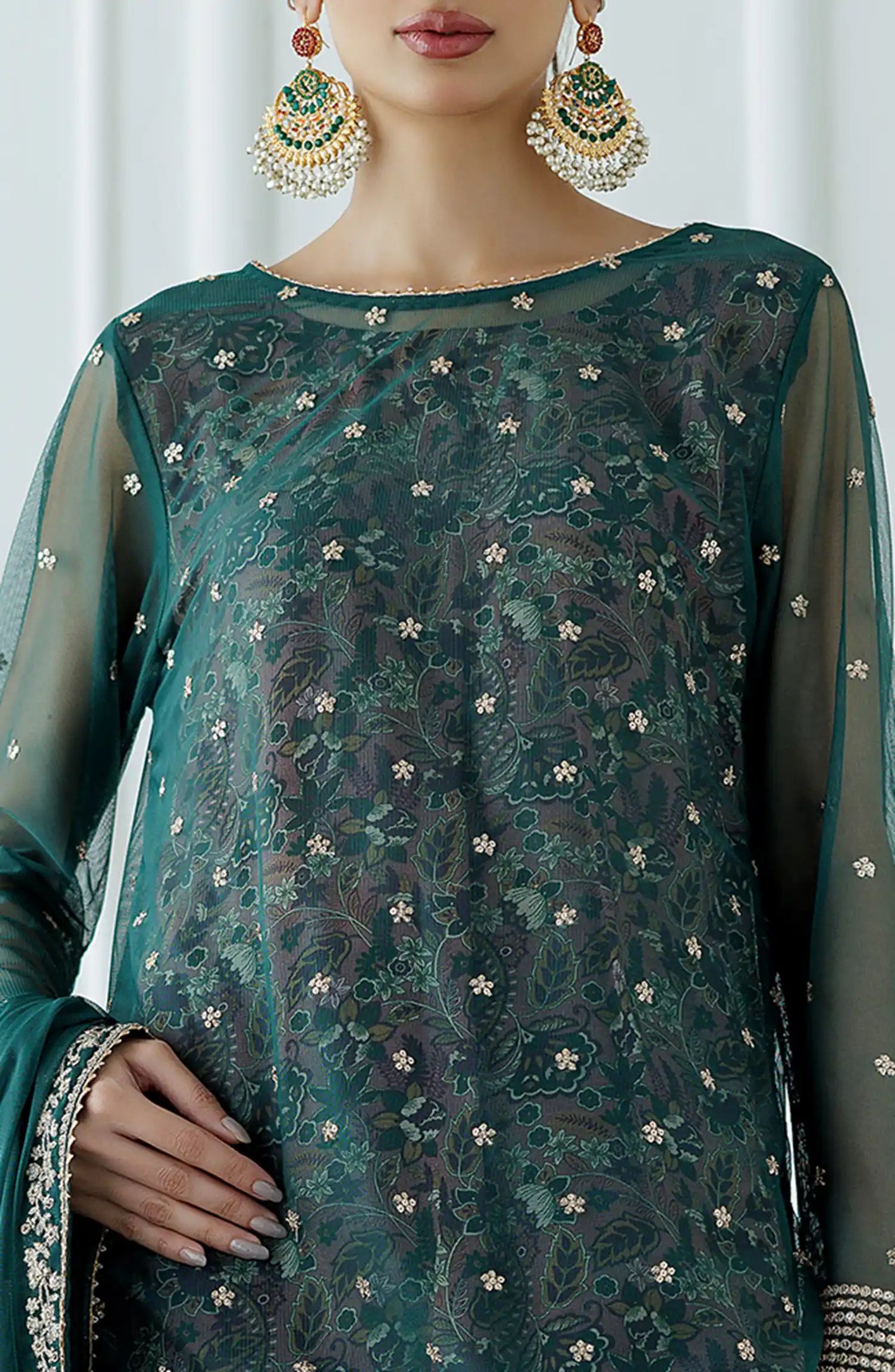 Women wearing a embroidered Teal traditional outfit with intricate embroidery on a farshi shalwar. Stitched Luxury Festive Formal Poly Net Shirt Dupatta & Pant - 3 Piece Suits - WRFP24W-3001
