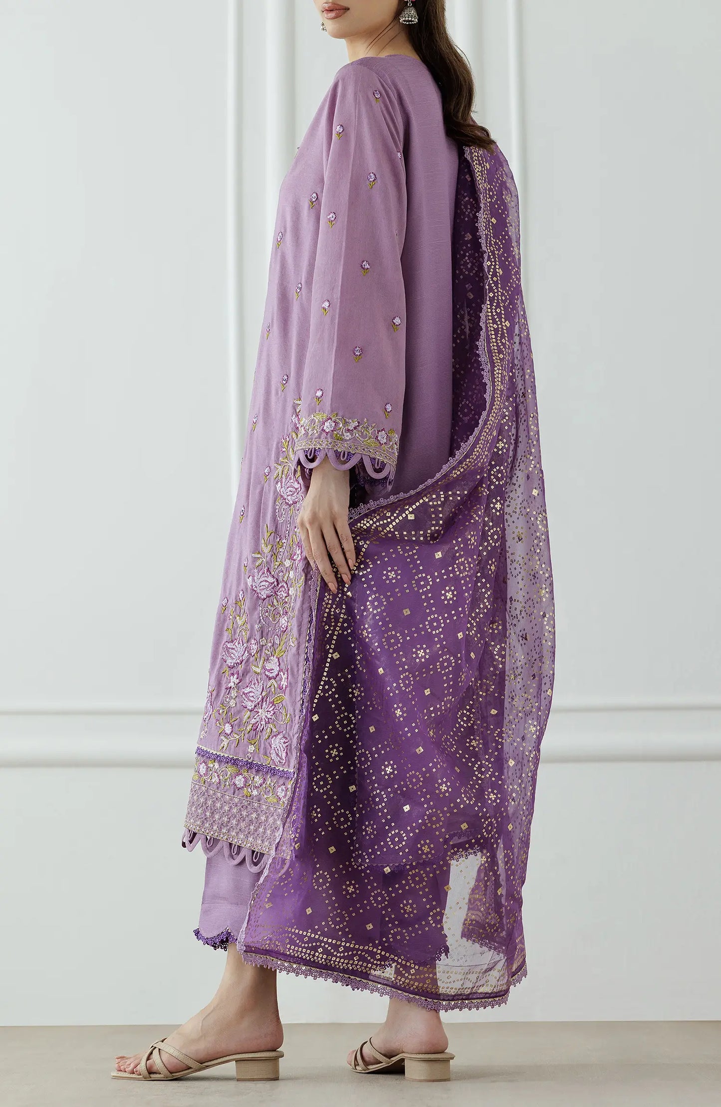 Women wearing a Purple embroidered traditional outfit with a matching dupatta on a dyed trouser. Stitched Luxury Festive Formal Raw Silk Shirt Dupatta & Pant - 3 Piece Suits - WRFR24W-3003