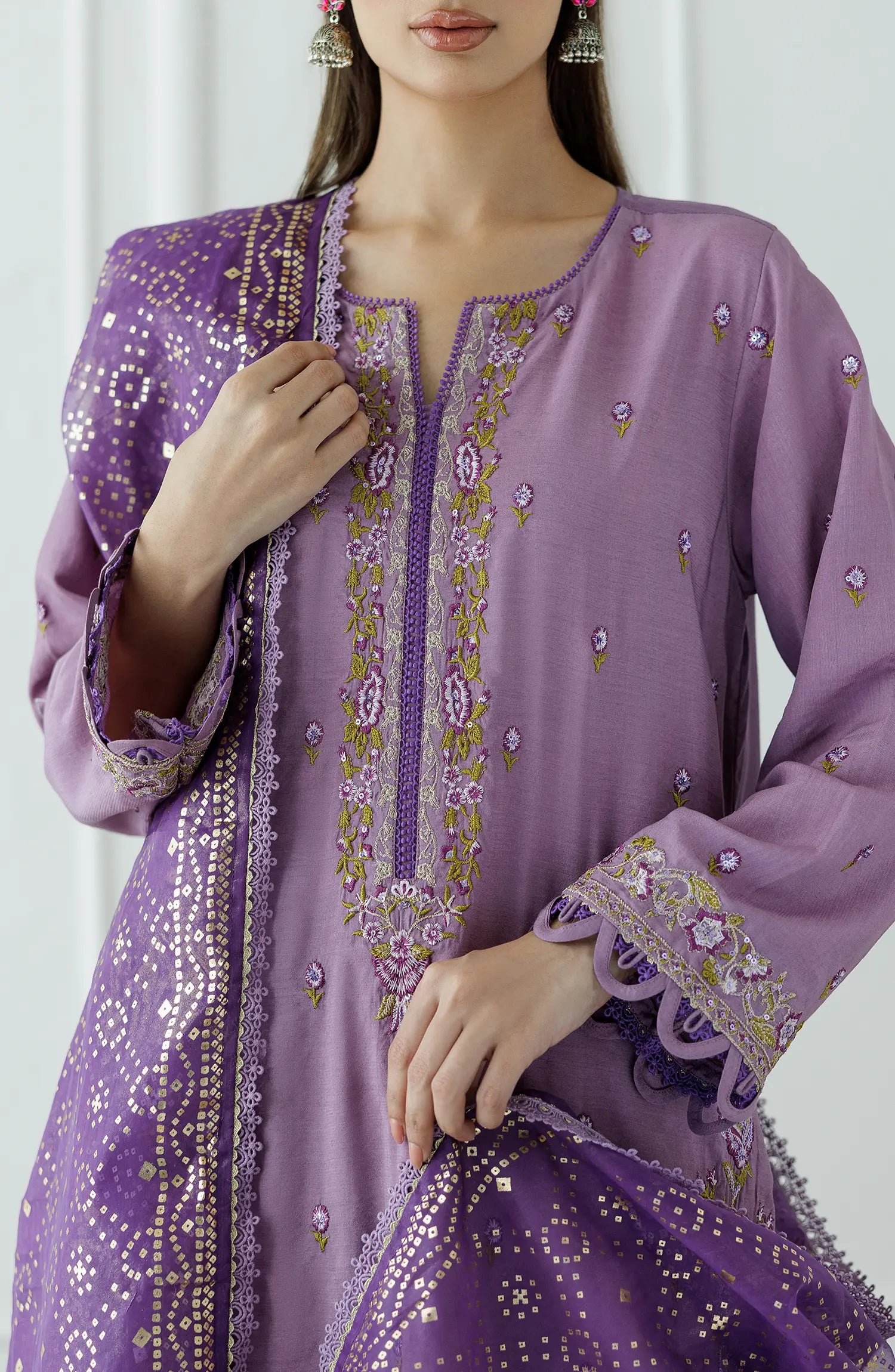 Women wearing a Purple embroidered traditional outfit with a matching dupatta on a dyed trouser. Stitched Luxury Festive Formal Raw Silk Shirt Dupatta & Pant - 3 Piece Suits - WRFR24W-3003