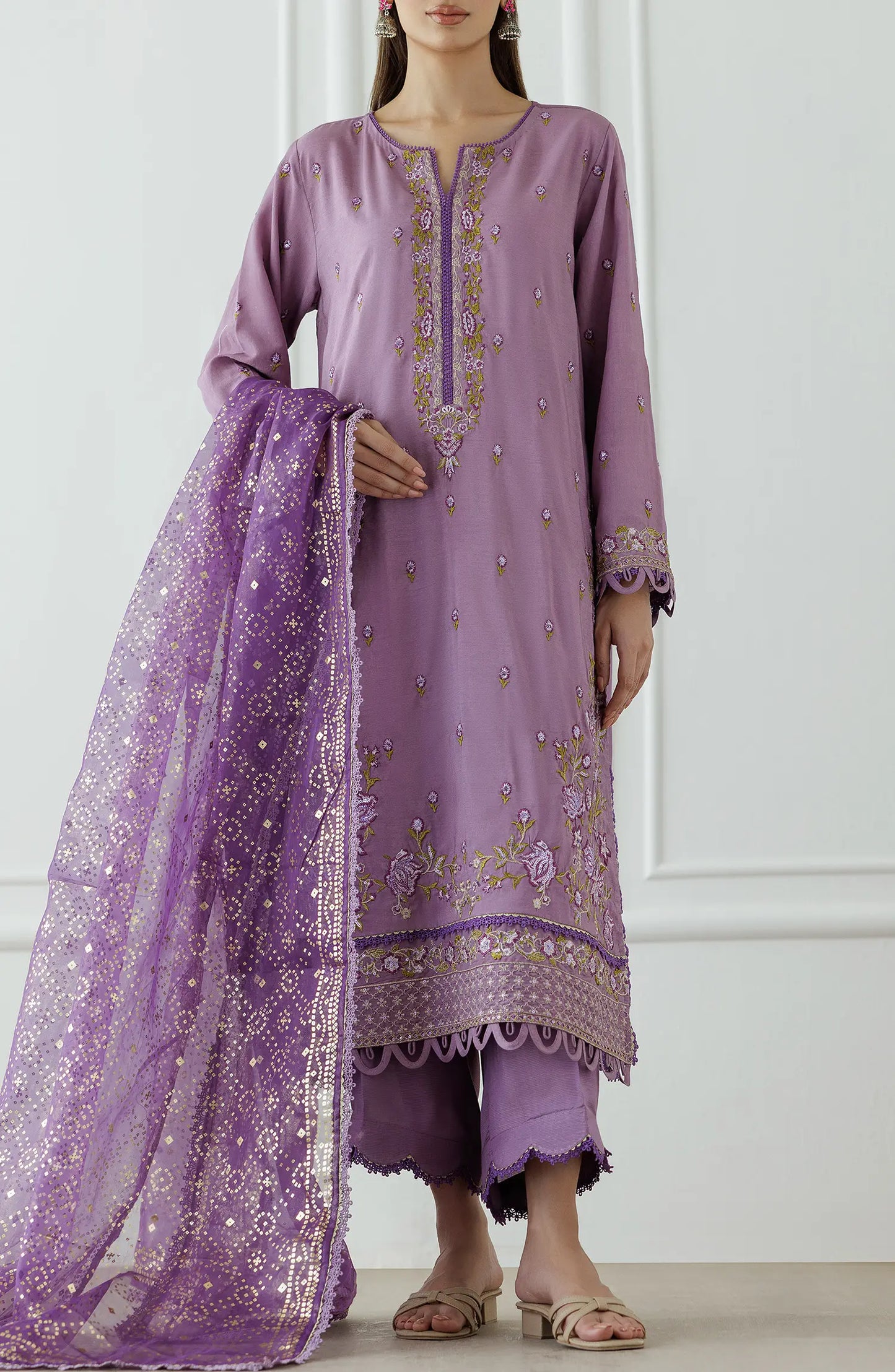 Women wearing a Purple embroidered traditional outfit with a matching dupatta on a dyed trouser. Stitched Luxury Festive Formal Raw Silk Shirt Dupatta & Pant - 3 Piece Suits - WRFR24W-3003