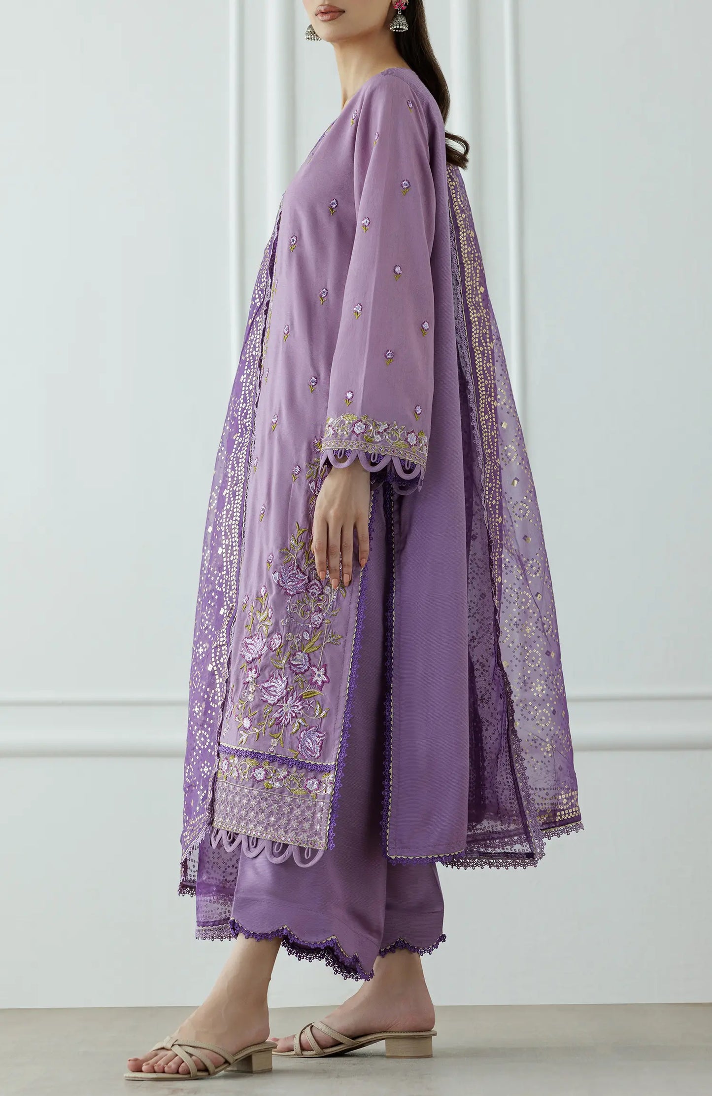 Women wearing a Purple embroidered traditional outfit with a matching dupatta on a dyed trouser. Stitched Luxury Festive Formal Raw Silk Shirt Dupatta & Pant - 3 Piece Suits - WRFR24W-3003