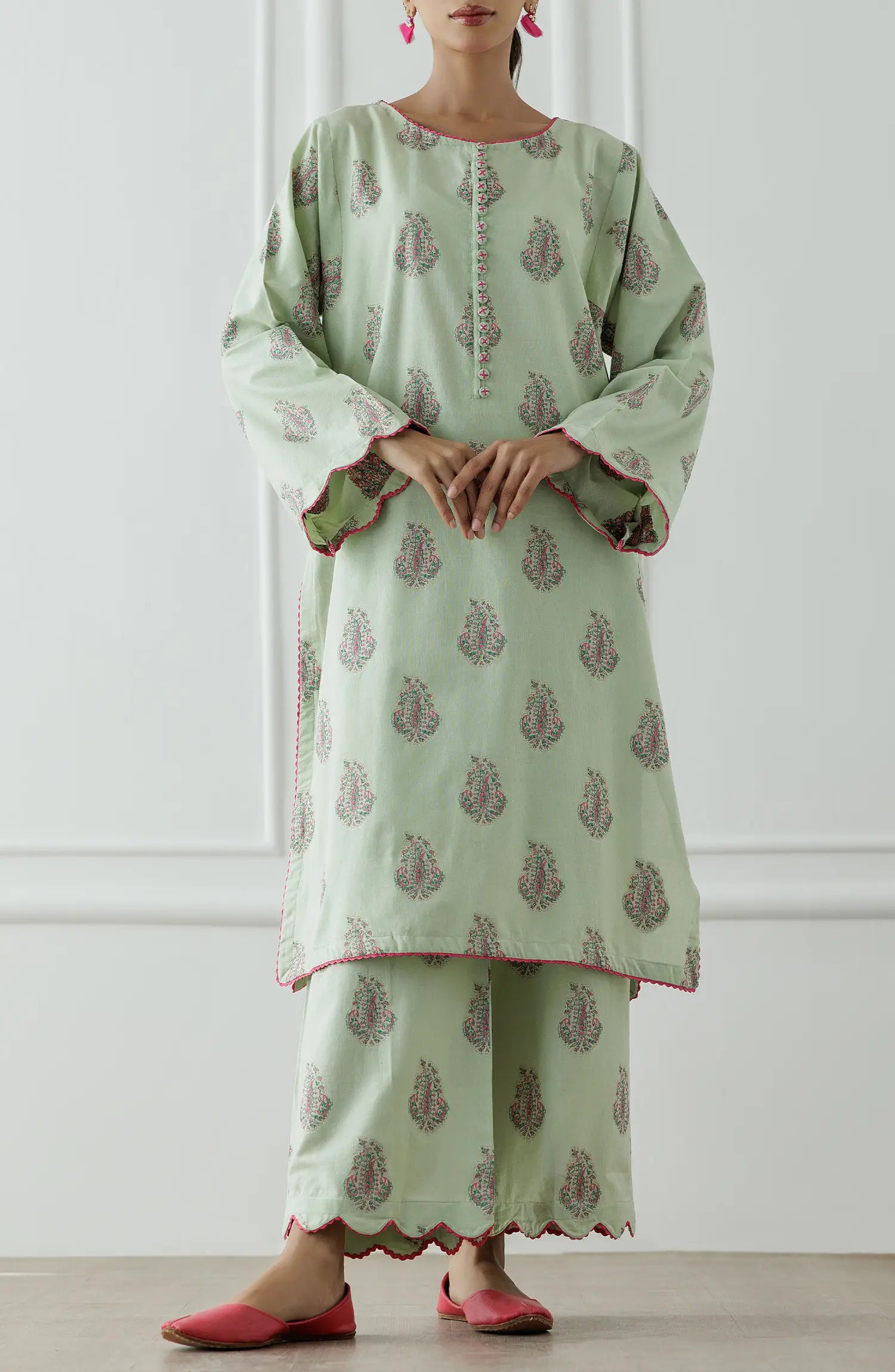 Stitched Dyed embroidered Lawn Jacquard Shirt & Pant - 2 Piece (CordSet) - WRHJ25S-2002. Light green dress with floral patterns and ruffled sleeves on a printed bottom.