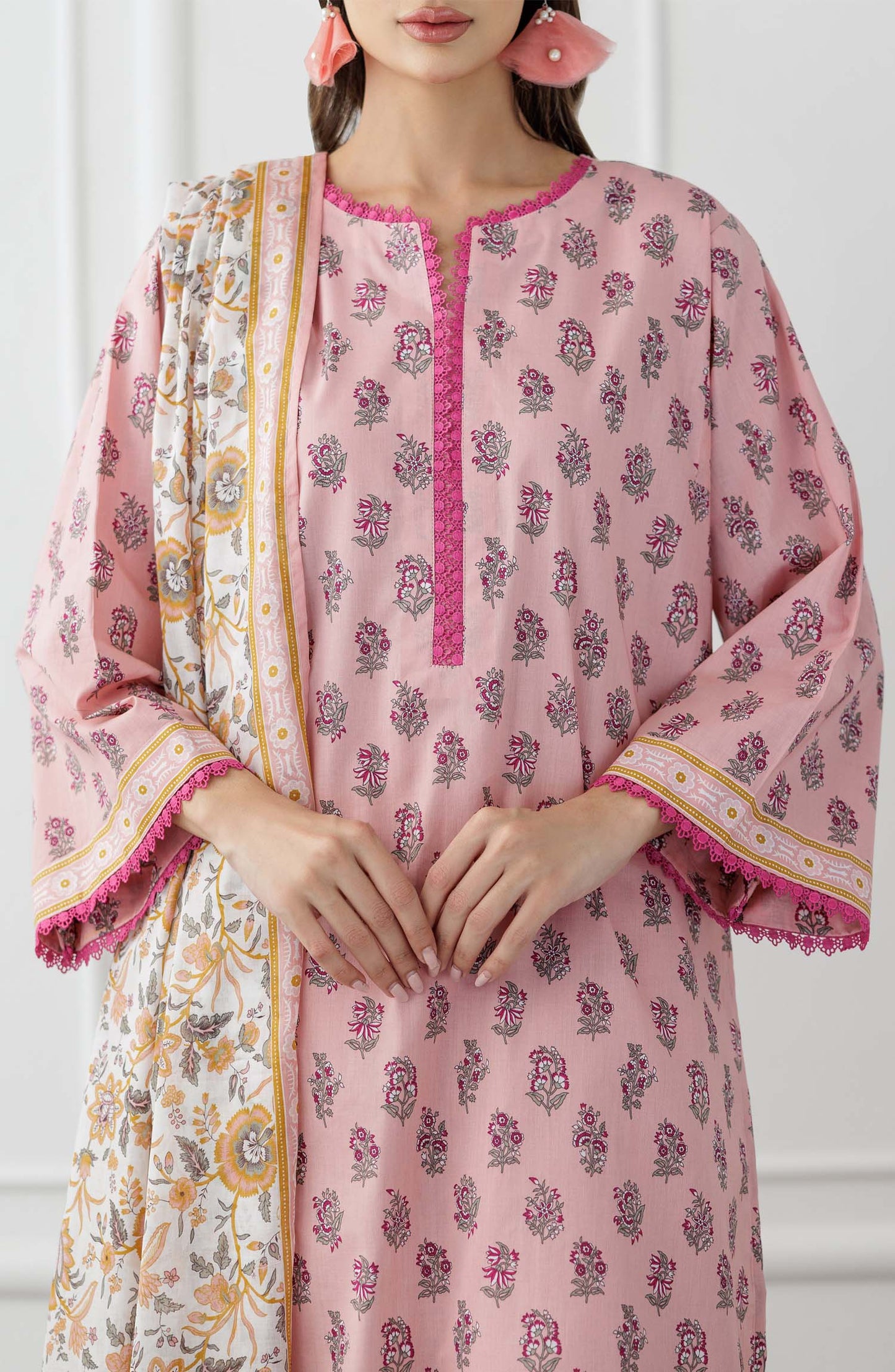UNSTITCHED Printed Lawn Shirt Dupatta & Pant - 3 Piece Suits - OTL-25-358. Woman wearing a pink traditional outfit with a matching dupatta and dyed trouser.