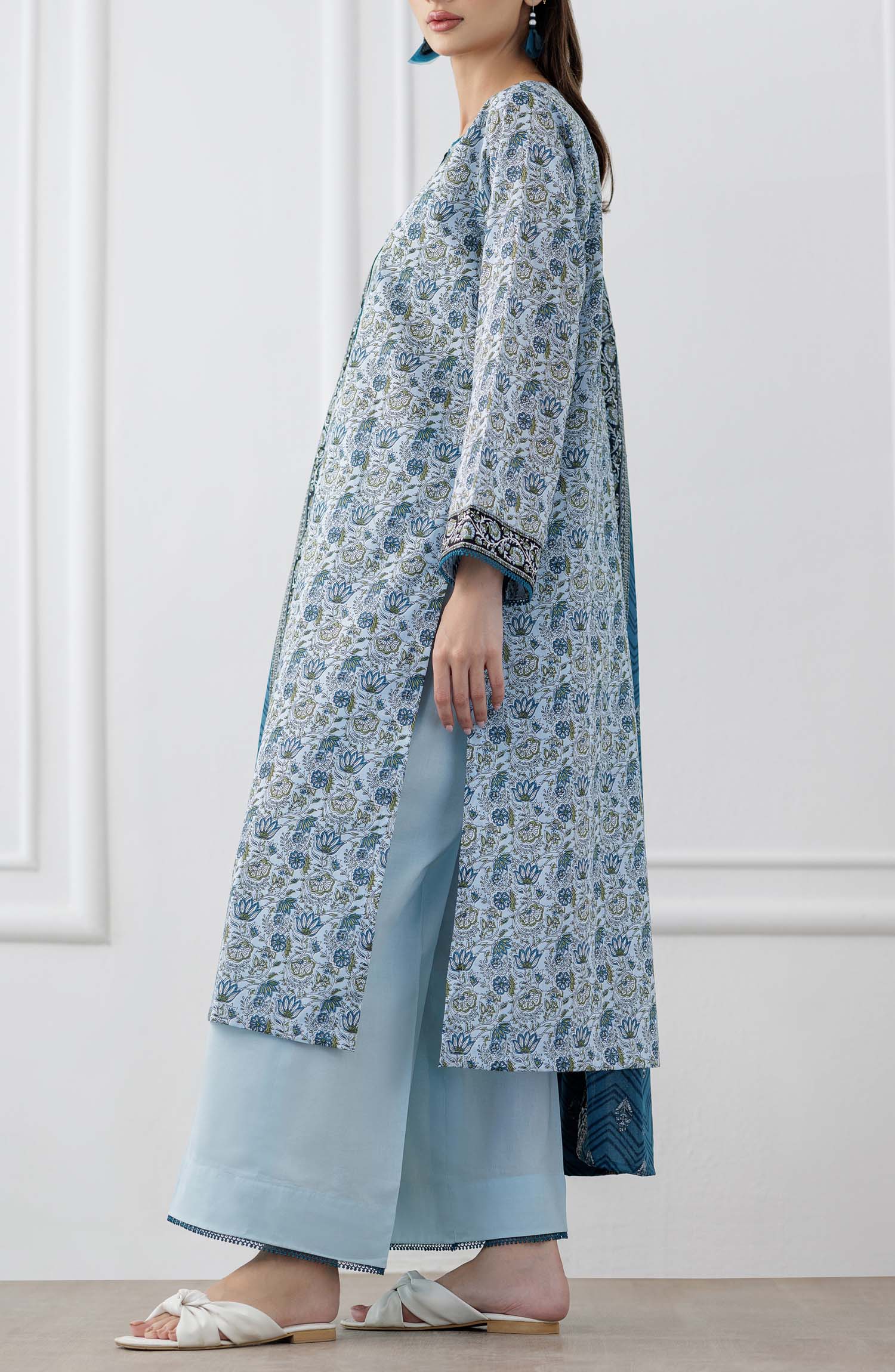 UNSTITCHED Printed Lawn Shirt Dupatta & Pant - 3 Piece Suits - OTL-25-347. Woman wearing a blue and white patterned kurta with a matching dupatta  and dyed trouser.